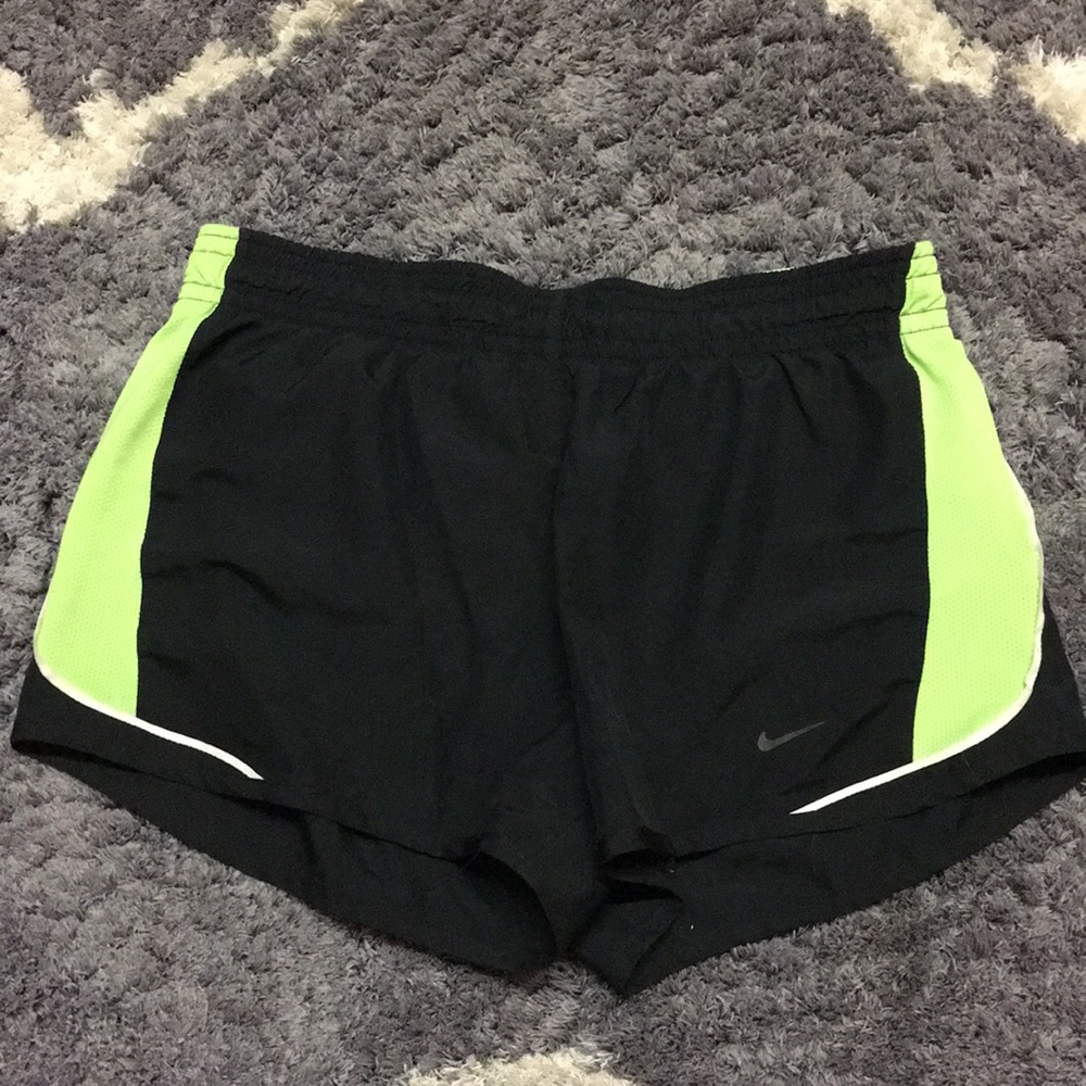 Black and green Nike Dri-Fit shorts